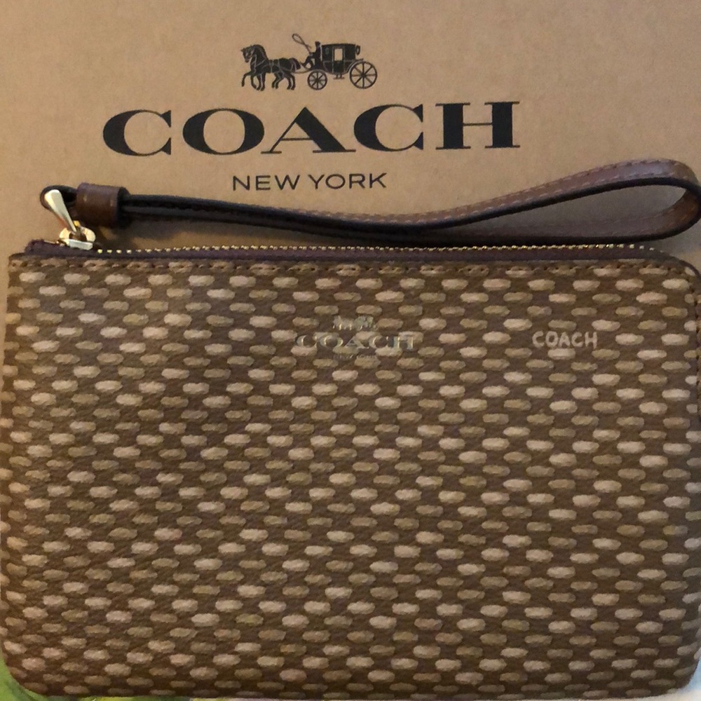 Light brown and dark brown coach wristlet